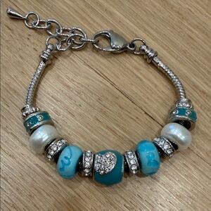 Elegant Silver and Blue Charm Bracelet